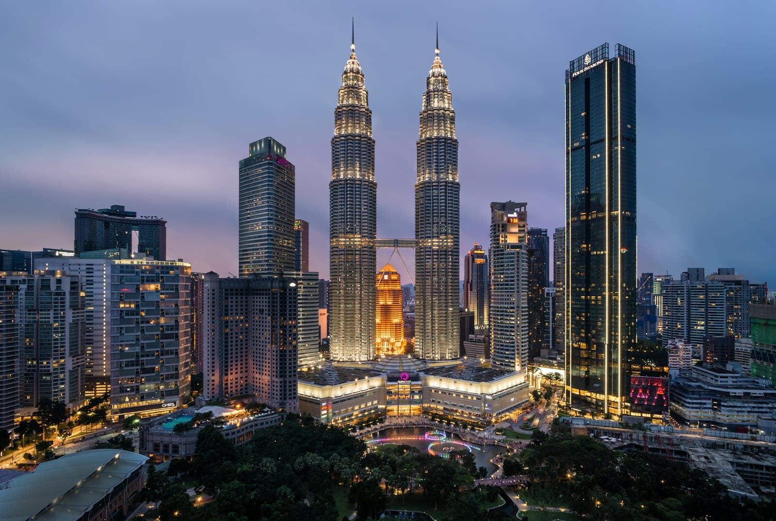 The Petronas Twin Towers and Kuala Lumpur skyline at twilight