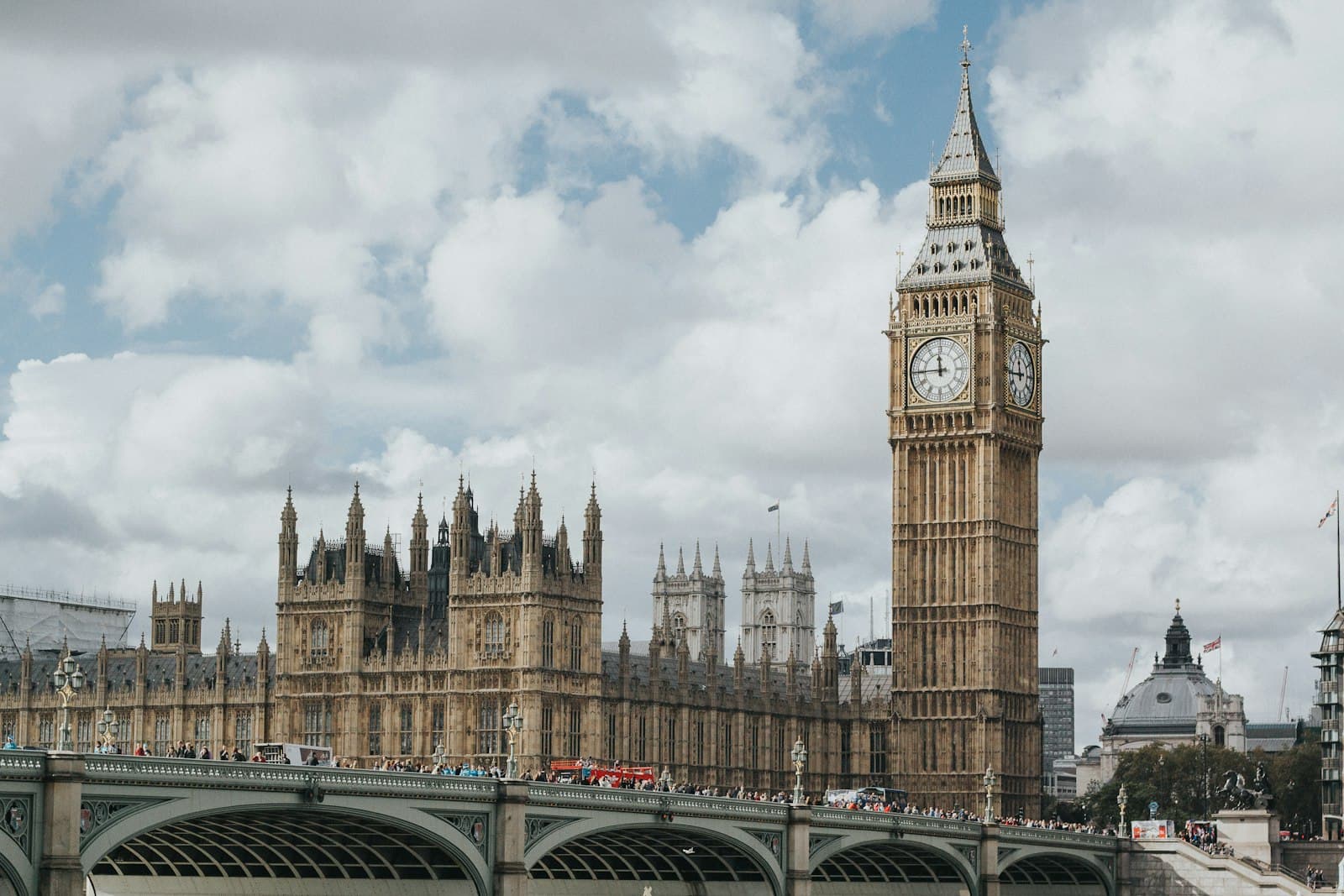 The Houses of Parliament and Elizabeth Tower in London under a bright sky